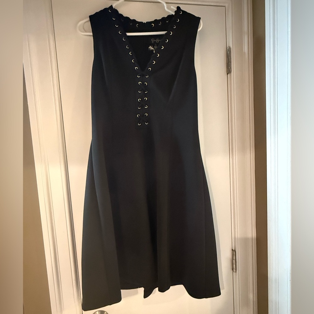 NWT Jessica Simpson Black v-neck, A-line Dress with lace-up Accents.